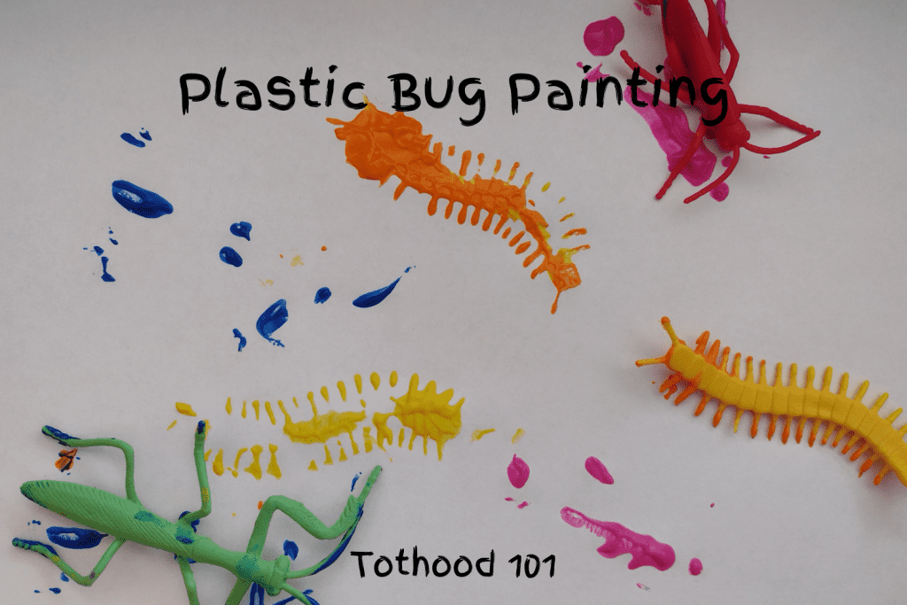 Plastic bug painting activity using a plastic praying mantis, and cricket and a centipede dipped in paint and placed on paper. 