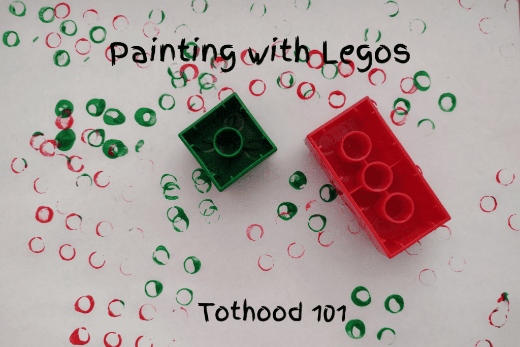 Lego Blocks painting activity done with green and red paint.