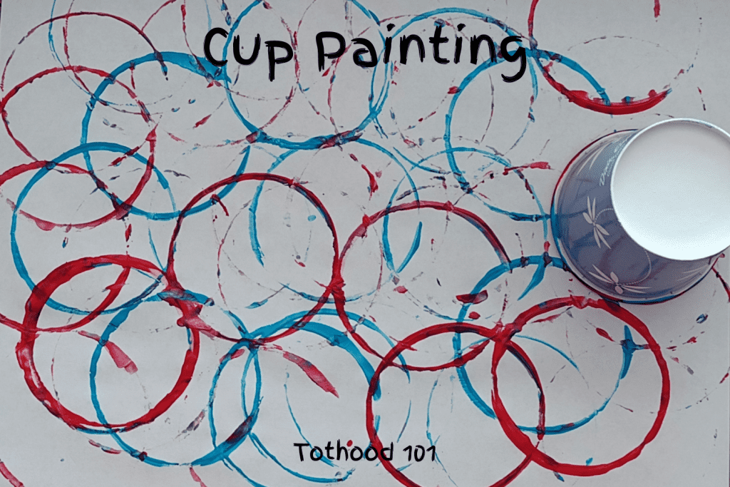 Cup painting activity done with blue and red paint.
