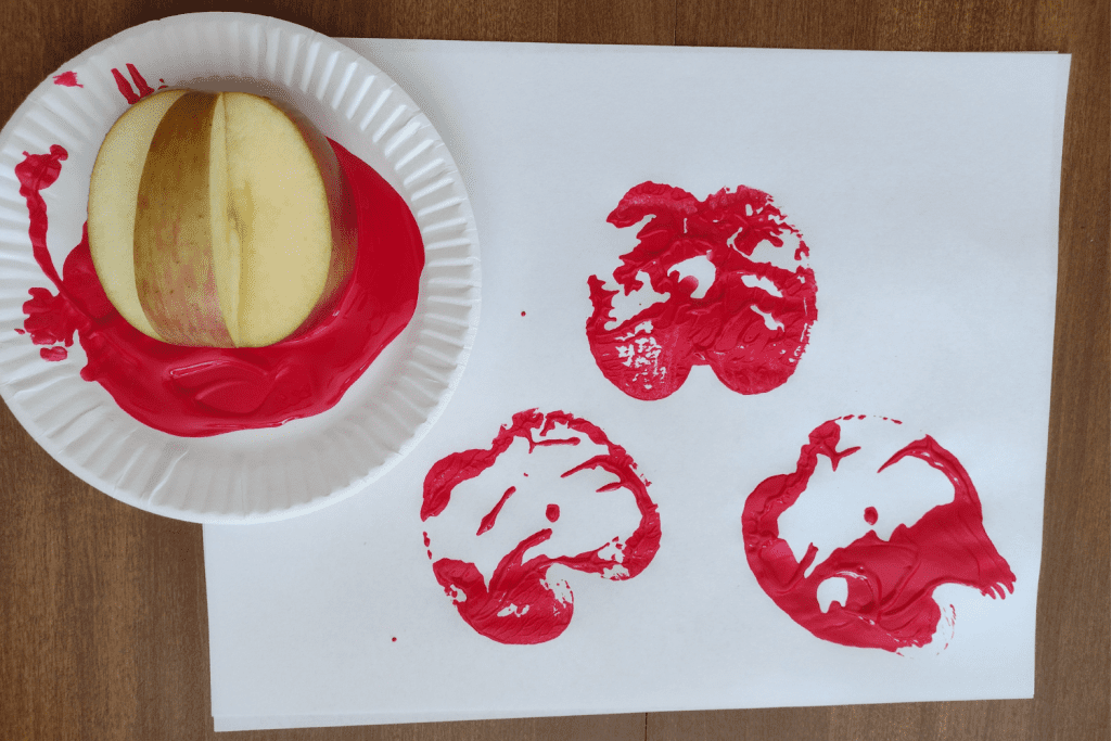 Apple prints with red paint
