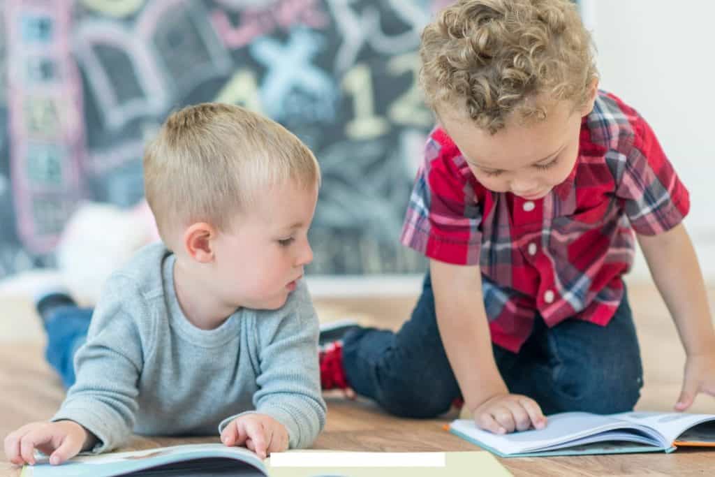two boys reading math books