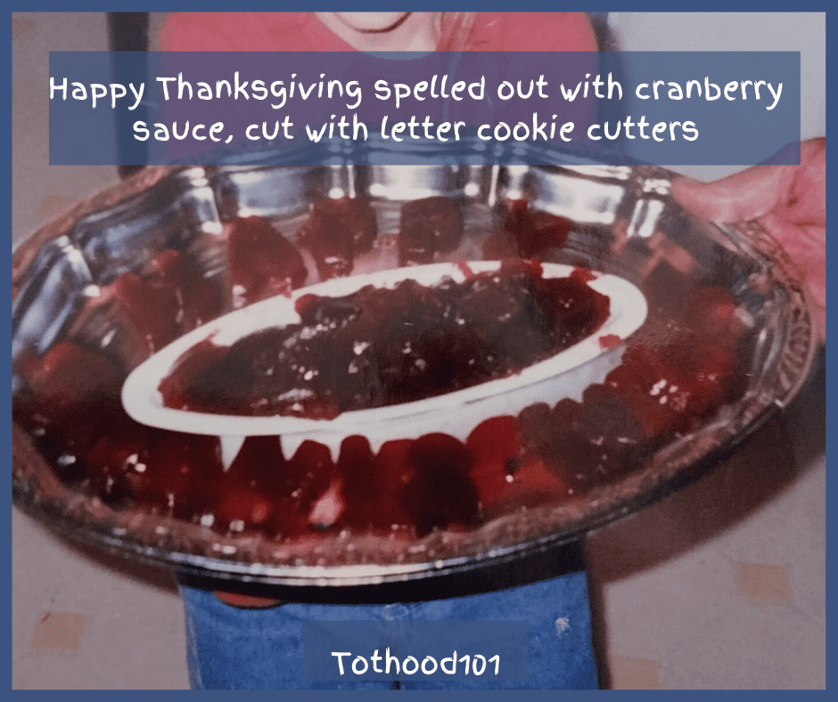 a tray of cranberry sauce with the words Happy Thanksgiving cut out with cookie cutters