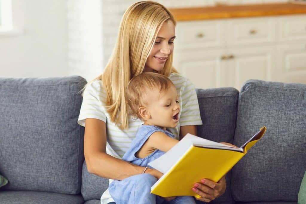 Mom reading to a toddler