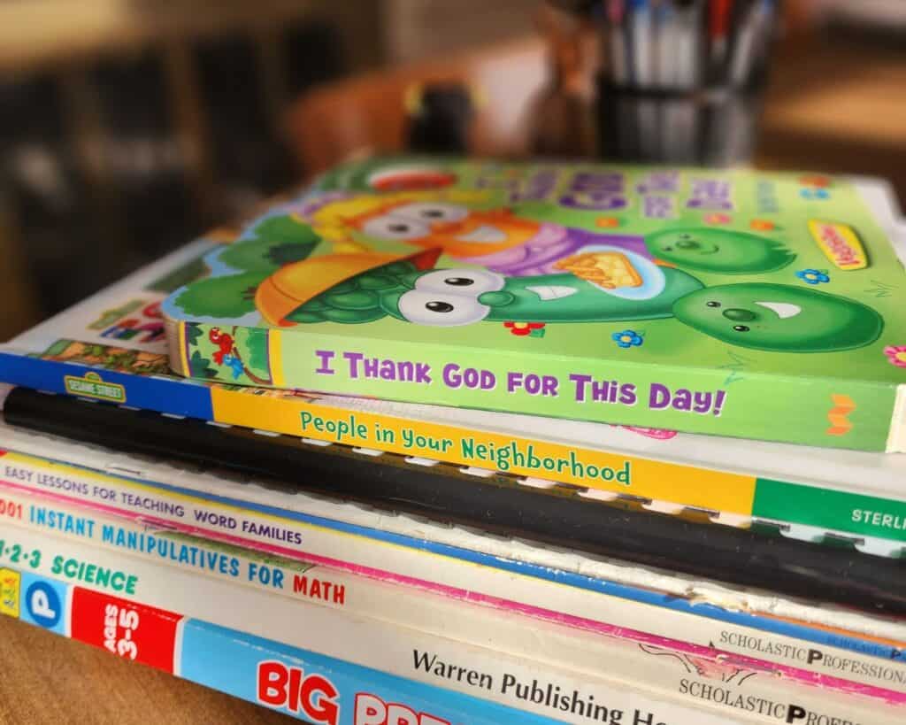 A stack of preschool curriculum books