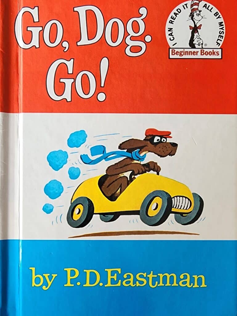 Book cover of Go, Dog. Go! by P.D. Eastman. A dog driving a car.