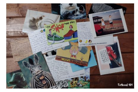 Postcards scatted on a table